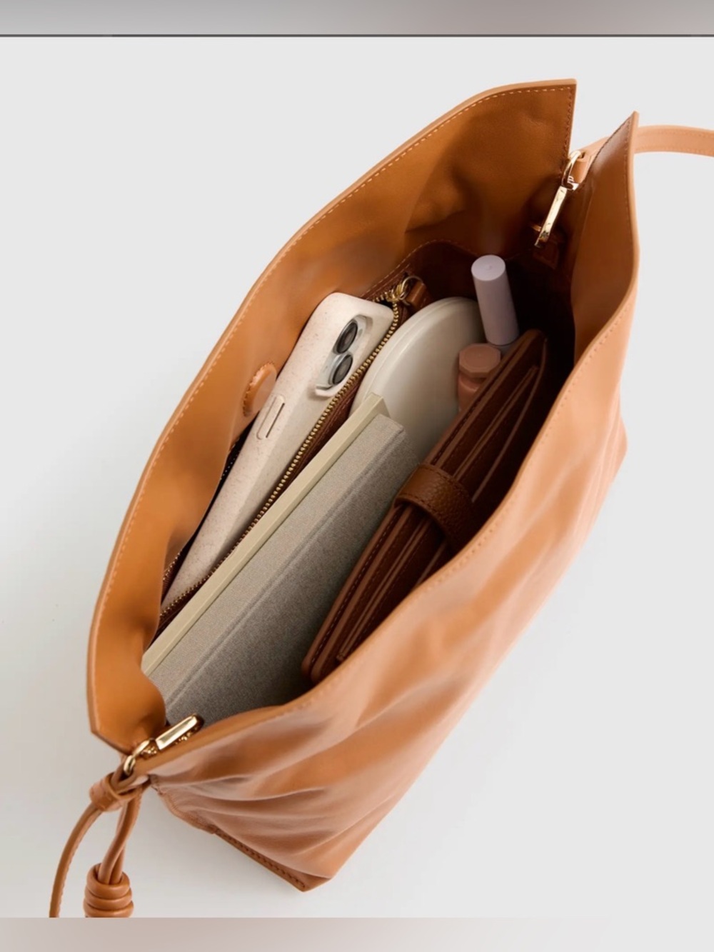 Quince Italian Leather Drawstring Pouch Crossbody Bag in Cognac - Picture 14 of 16